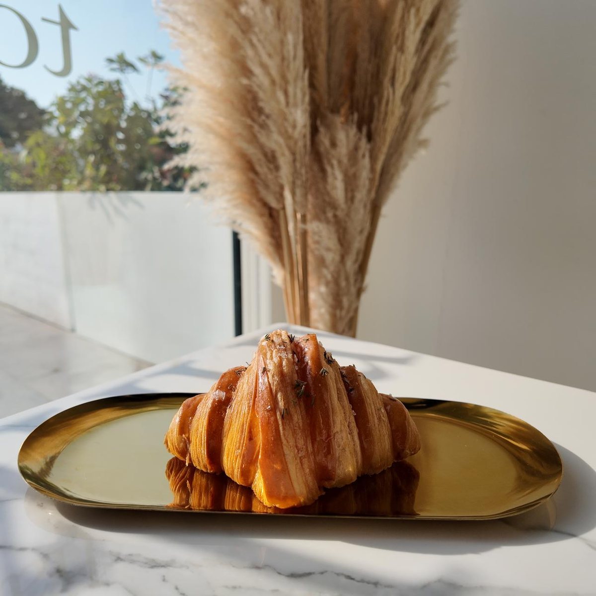 Burnt salted honey croissant